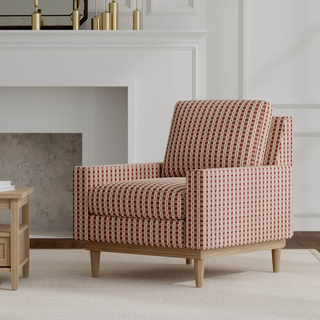 Clayton Pomegranate upholstered on a mid century modern chair