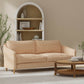 Ebern Peach upholstered on a couch