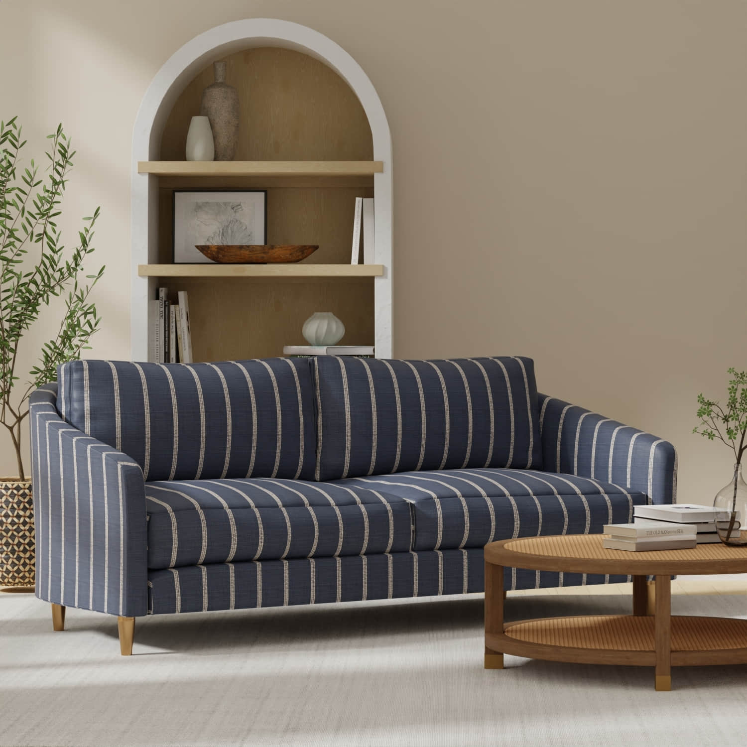 Kaleb Navy upholstered on a couch