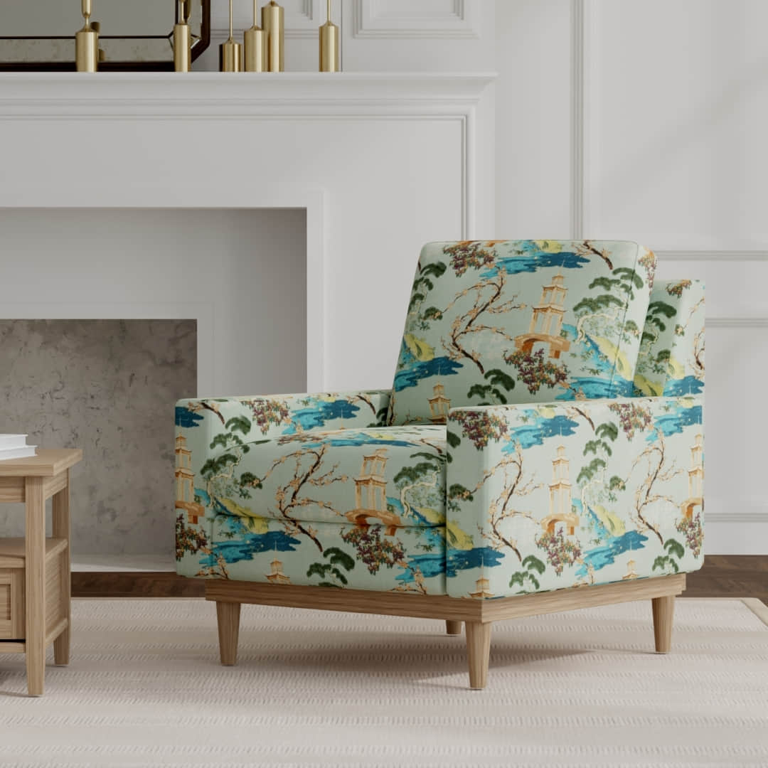 Linford Seaspray upholstered on a mid century modern chair