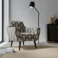 Simone Smoke upholstered on a contemporary chair