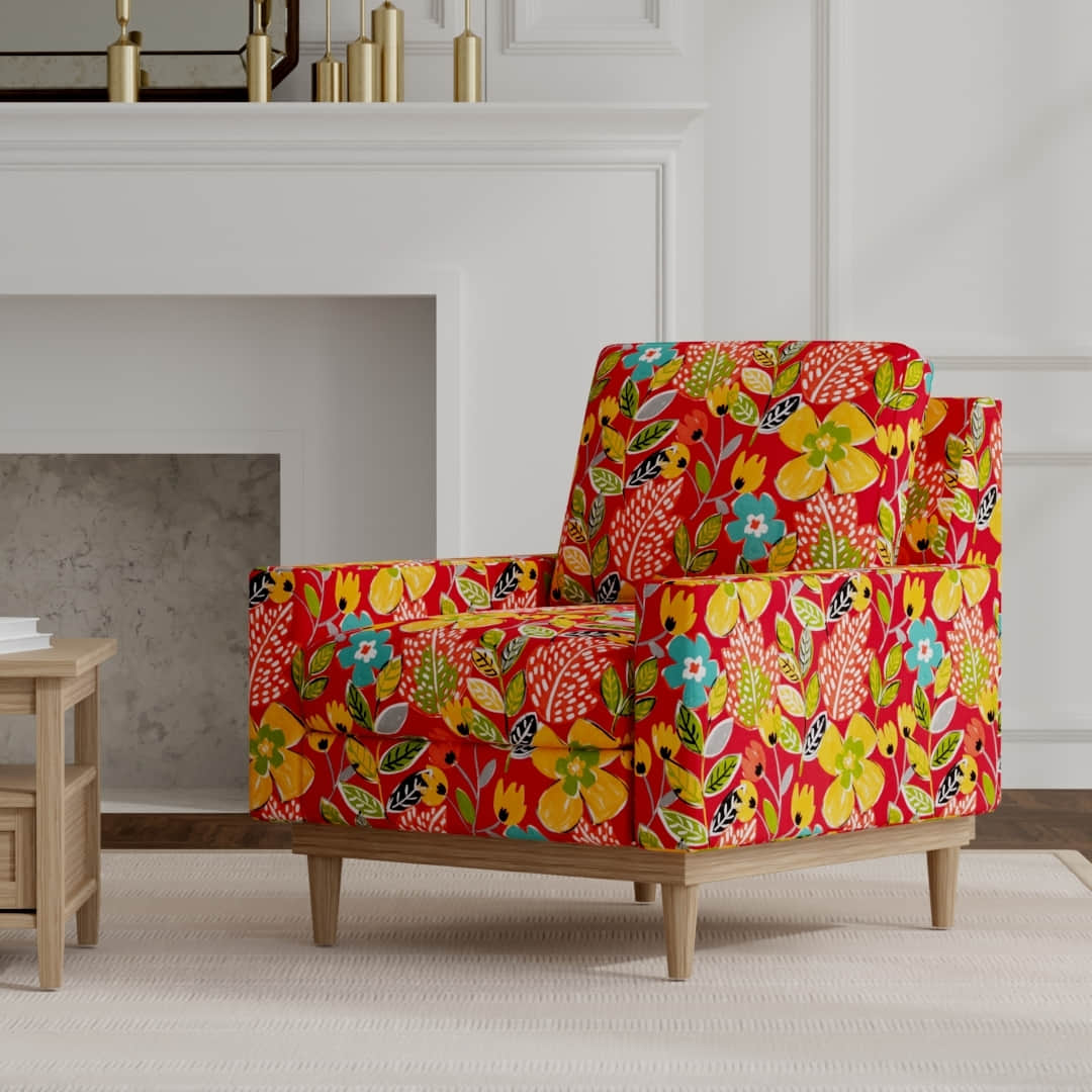 Zanzibar Poppy upholstered on a mid century modern chair