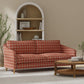 Zuni Terracotta upholstered on a couch